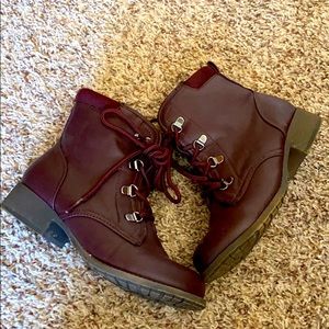 Burgundy ankle boots.